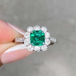 antique European cut diamonds halo on 0.97 carat Colombian emerald