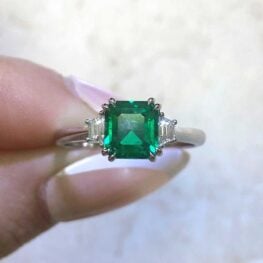 mayfield ring from Colombia no oil emerald with diamond on each side