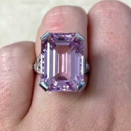 utopia cocktail ring shocasing a kunzite diamond and ruby