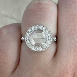 parma engagement ring featuring a 1.54 carats bezel set round rose cut diamond