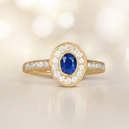 A vintage French ring featuring a 0.40 carat oval cut sapphire center 15121