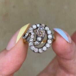 antique valeene ring featuring a snake with rubies, diamonds and old mine cut brown diamond