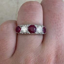 Wilhelmina Ring from 1900 featuring three round cut rubies set in prongs