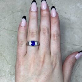 Sapphire Three Stone Ring Vercelli Ring Top View Hand Photo Zoomed out