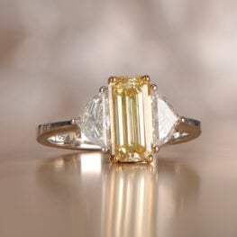 bowen engagement ring featuring a yellow fancy diamond