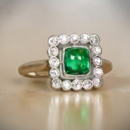 Cabochon Emerald and Diamond Halo Ring Artistic