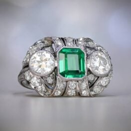Edwardian Era Emerald and Diamond Three Stone Ring Artistic