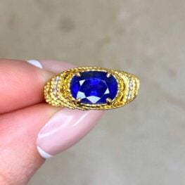 zadar vintage ring with a sapphire prong set and fine milgrain