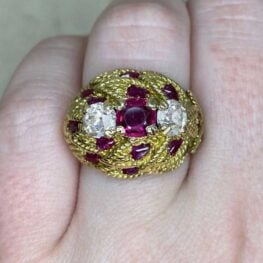 Vintage Pilton Ring from 1970s featuring a natural cushion cut ruby